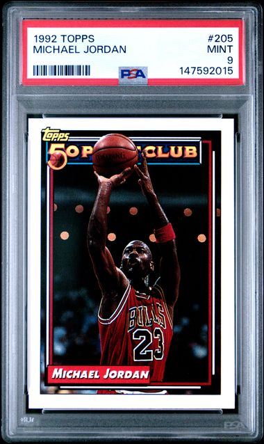 PSA-graded 1992 Topps Michael Jordan card #205 in clear plastic slab showing front with red uniform and basketball.