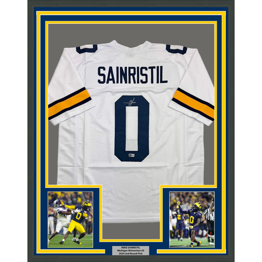 White Michigan football jersey number 0 with "SAINRISTIL" across chest, framed with blue and yellow borders, flanked by two action photos and nameplate below.
