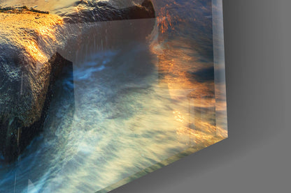 Silky Waves Over Boulders Glass Wall Art