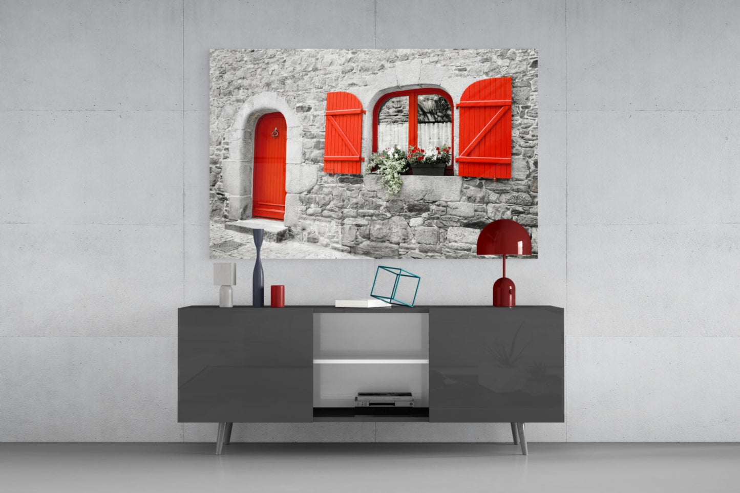 Red Door Glass Wall Art displayed above a dark grey media console in a modern living room setting with white walls.