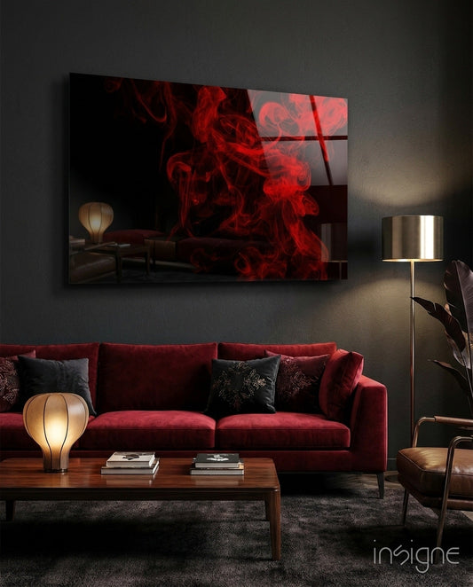 Rising Red Smoke Wisps Glass Wall Art mounted above burgundy sofa in modern living room with warm lighting.