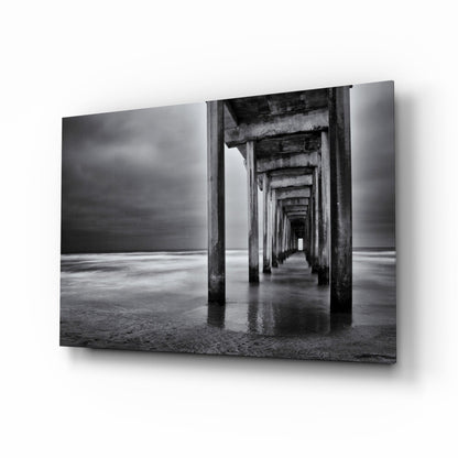 Moody Under Pier Perspective Glass Wall Art