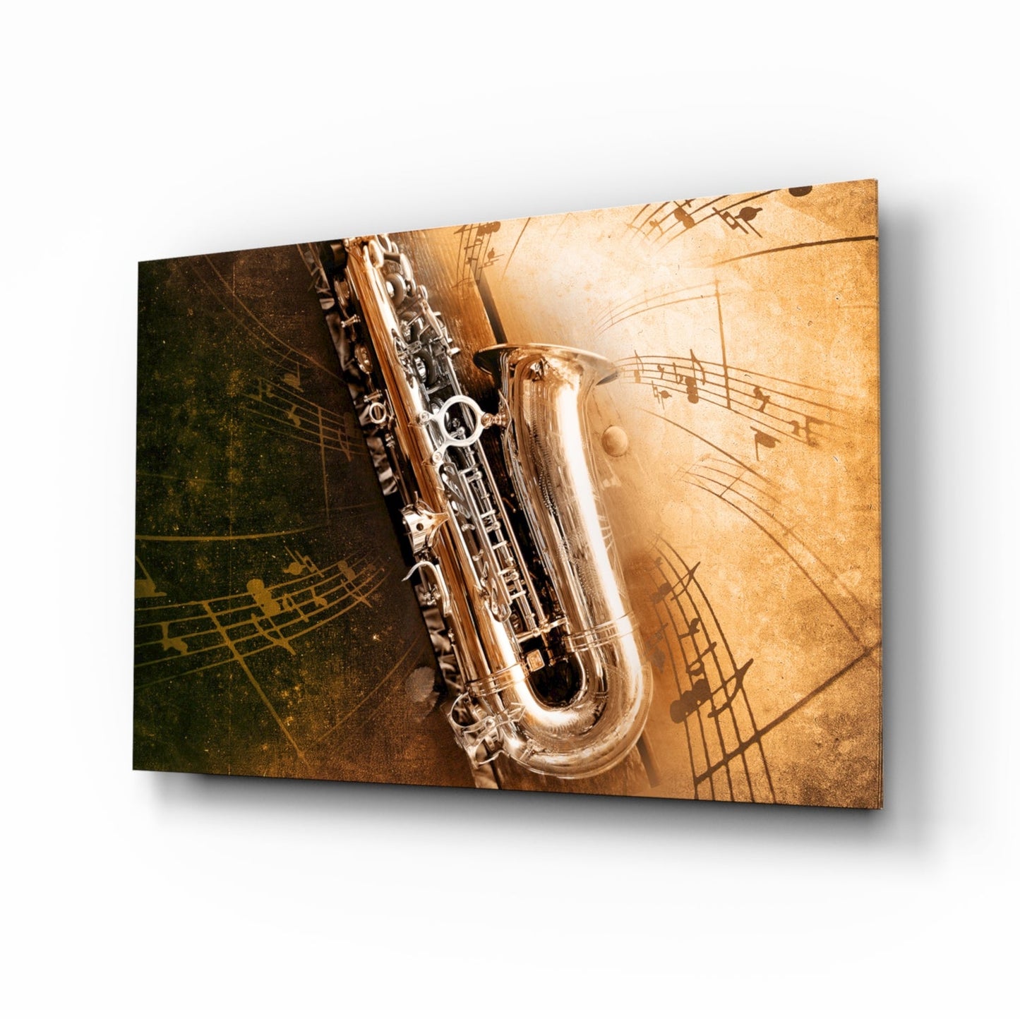 Angled view of glass wall art featuring a polished saxophone overlaid on aged sepia and dark backgrounds with musical notation.