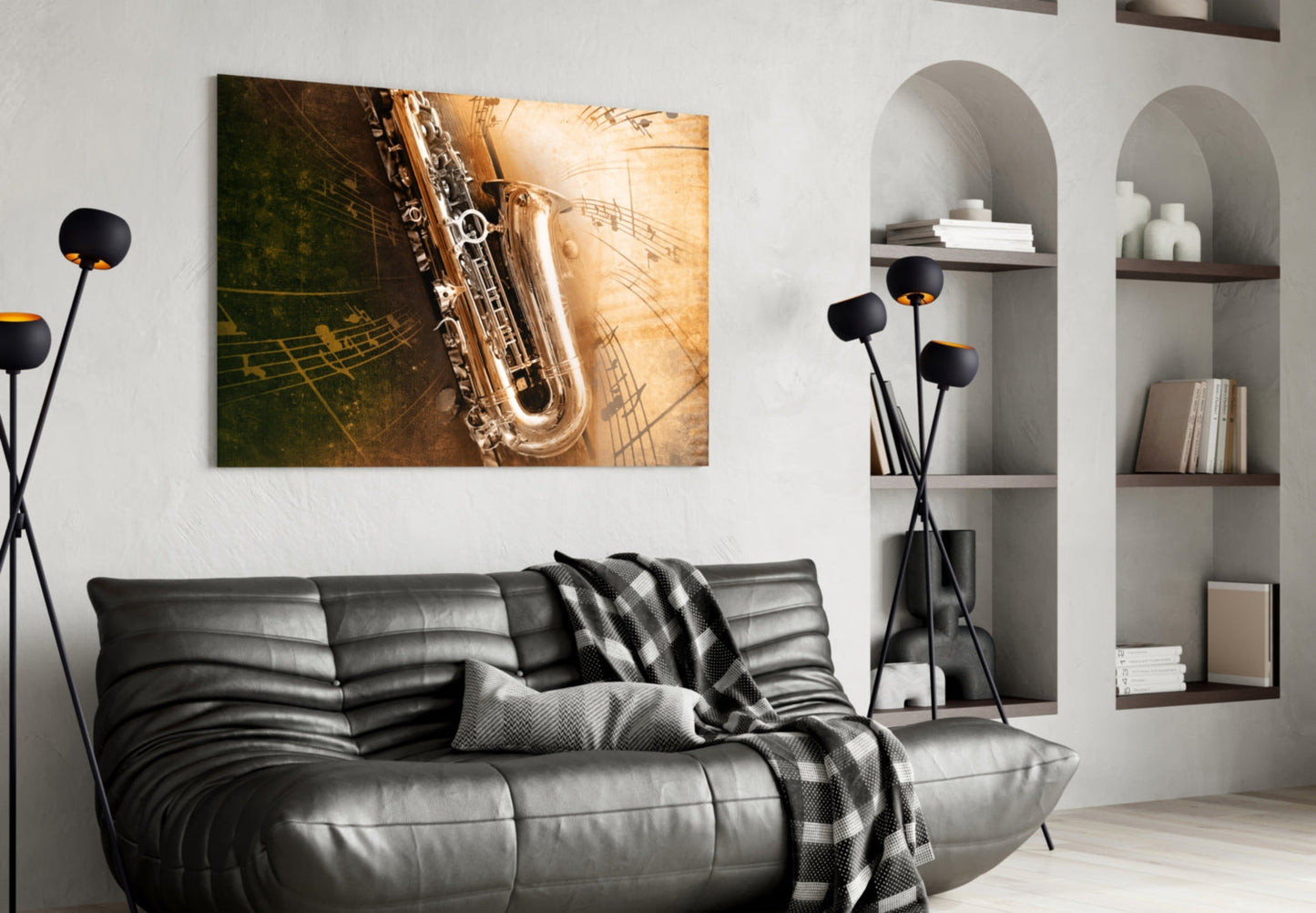 Saxophone glass wall art with musical notes on warm gold and green background, displayed above black leather sofa in modern living room.