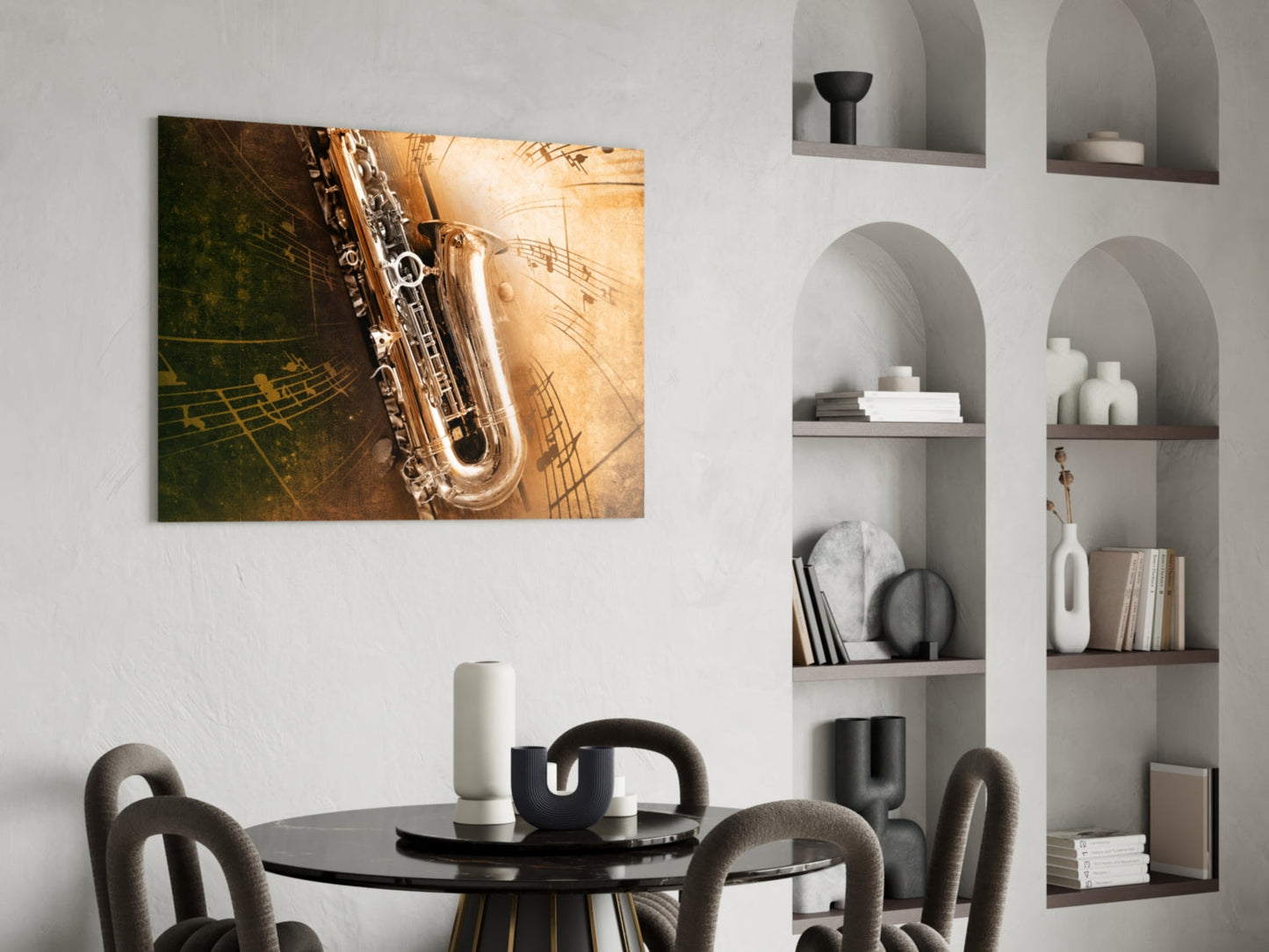 Saxophone glass wall art with musical staff background displayed above black round dining table in modern interior with built-in shelving.