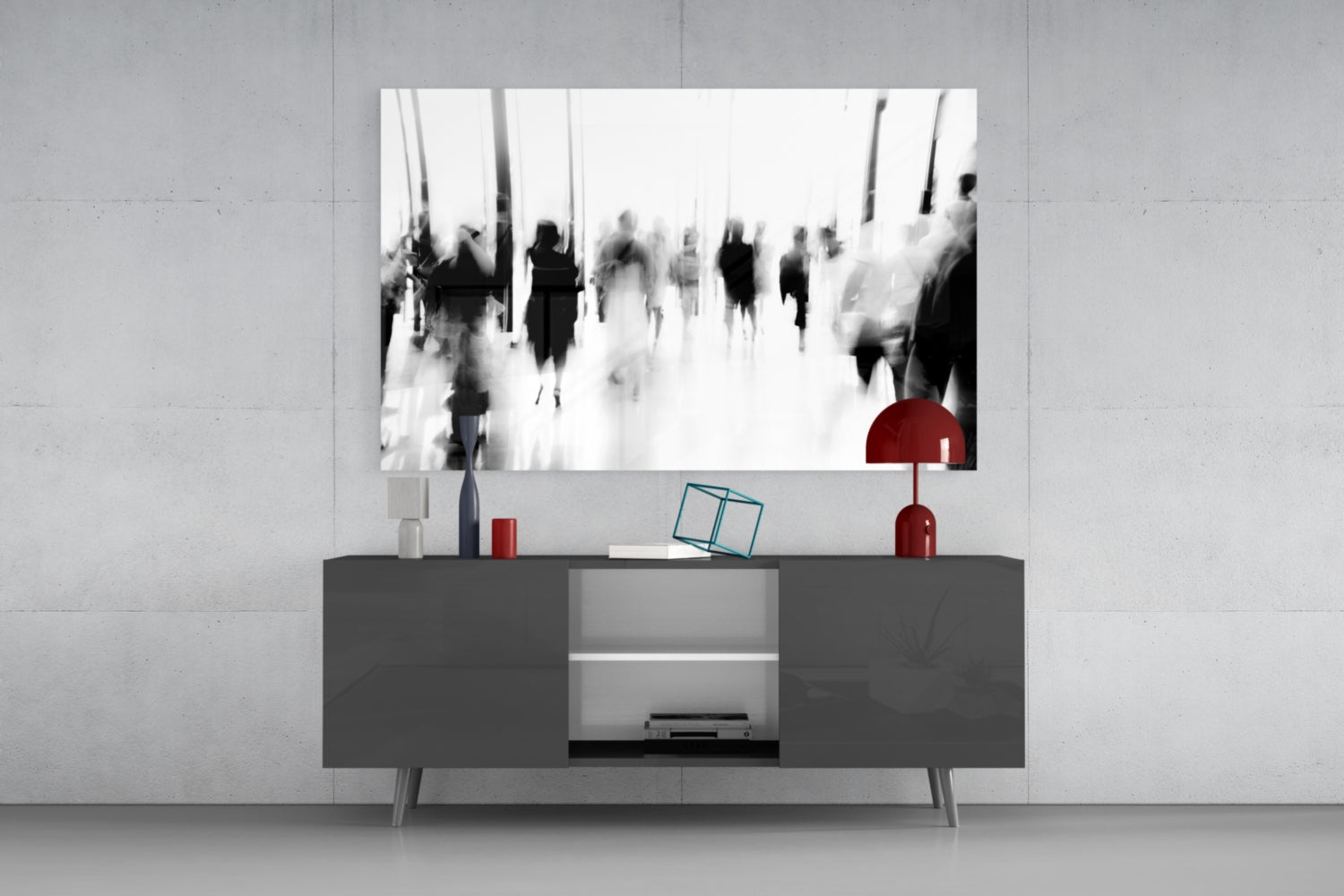 Black and white glass wall art depicting blurred crowds displayed above a dark gray media console with red decorative accents.