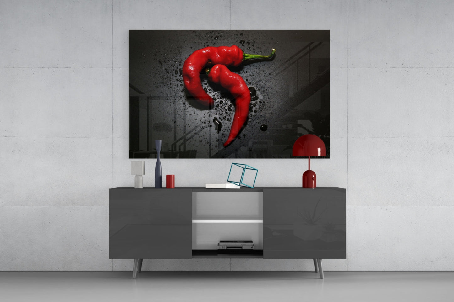 Red Pepper Glass Wall Art mounted above gray media console, displaying vibrant red chili peppers against dark textured background.