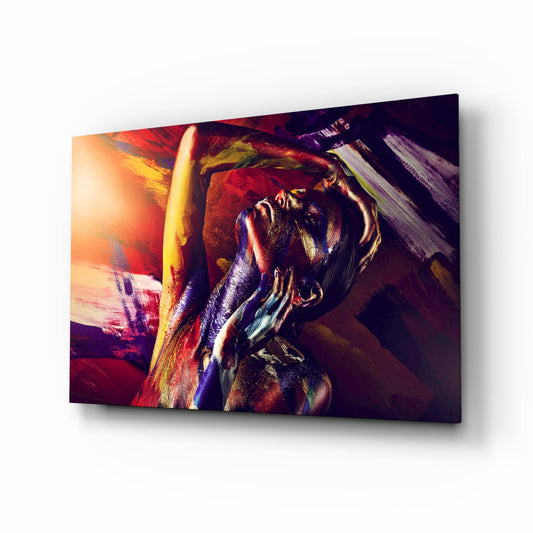 Abstract portrait of a woman's face in vibrant reds, golds, and purples on glass with dramatic lighting and brushstroke effects.