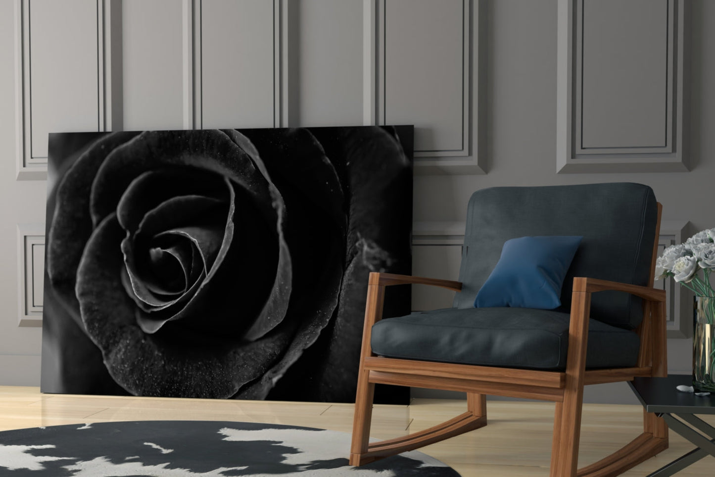 Black Rose Glass Wall Art displayed in modern living room with mid-century wooden chair and blue cushions.