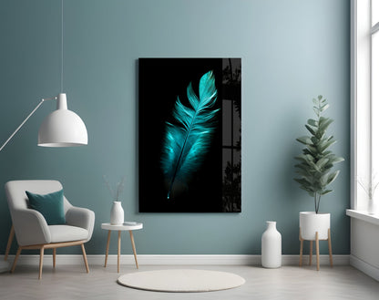Glowing turquoise feather on black background displayed as wall art in minimalist room with white chair and plants.