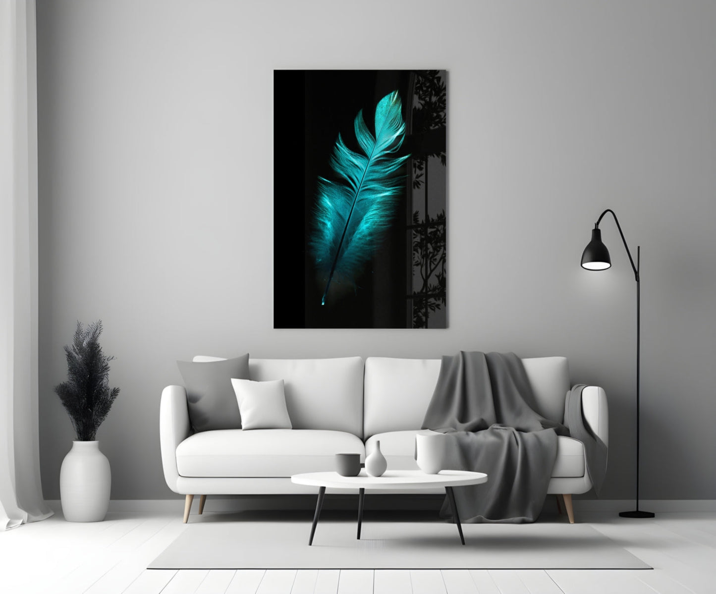 Turquoise feather glass wall art displayed above white sofa in minimalist living room setting.