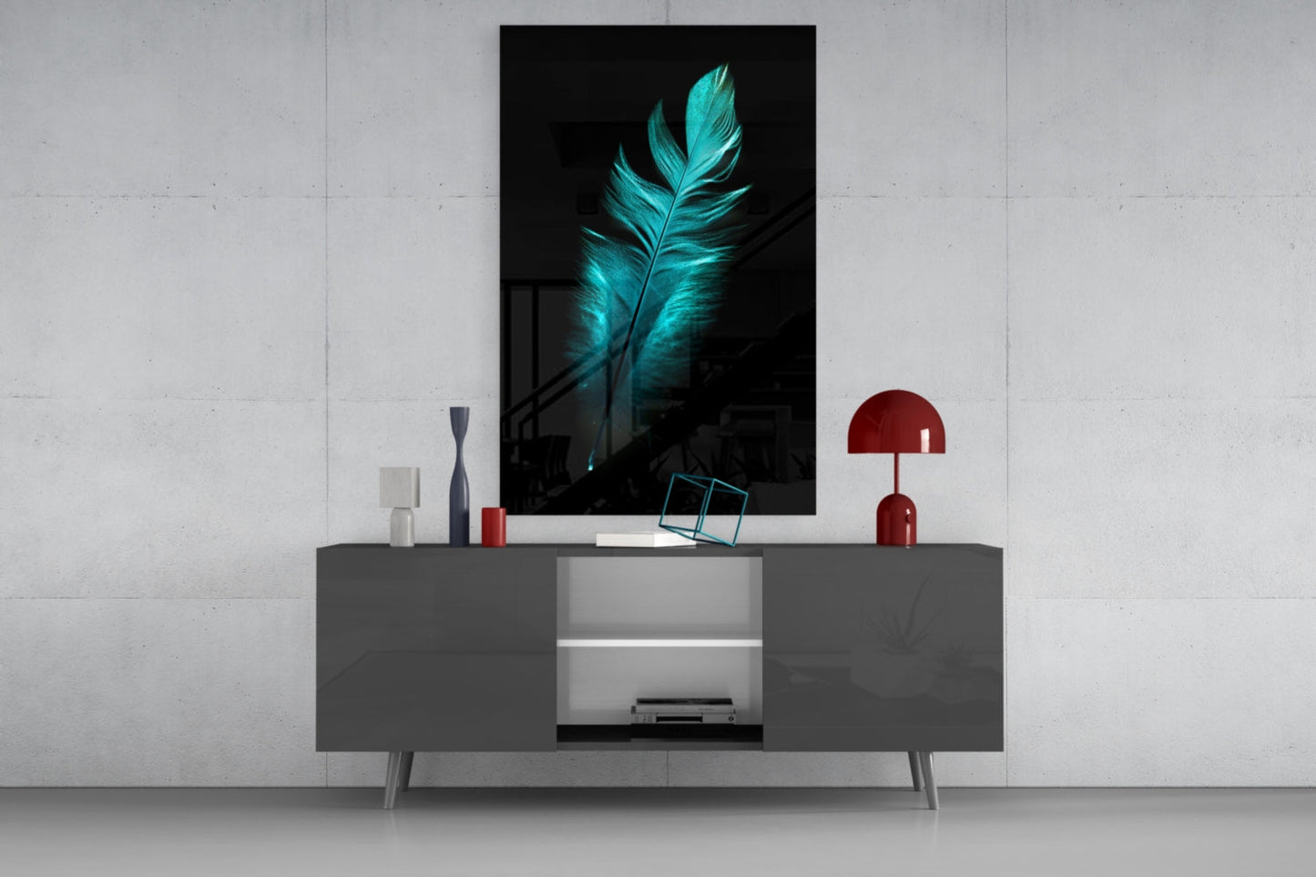 Glowing turquoise feather glass wall art displayed above gray media console with red lamp and decorative accessories.