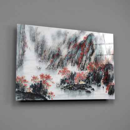 Glass wall art mounted on gray wall displaying misty landscape with red flowering trees, black ink brushwork, and white water in traditional Asian painting style.