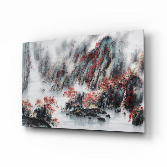 Japanese Drawing Glass Wall Art displaying misty mountains with red autumn trees and a small pavilion, mounted at an angle against white background.