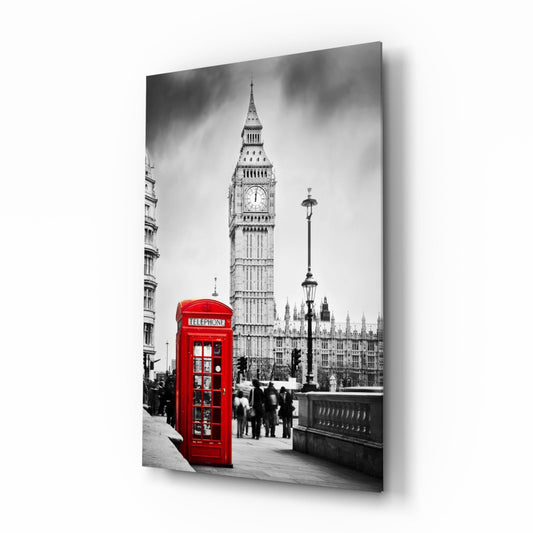 Red British telephone box with Big Ben and Parliament in black and white background on glass wall art panel.