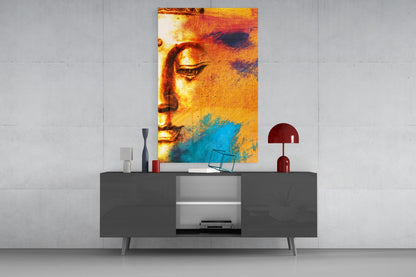 Buddha Portrait Glass Wall Art displayed above gray console table, showing golden-orange face with blue watercolor wash effect.