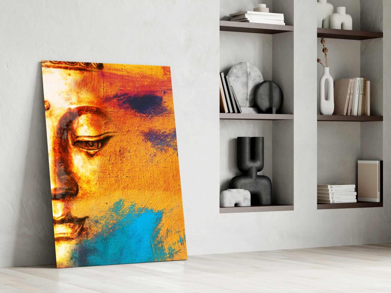 Buddha portrait glass wall art leaning against white wall, displaying warm orange and cool blue tones with textured surface.