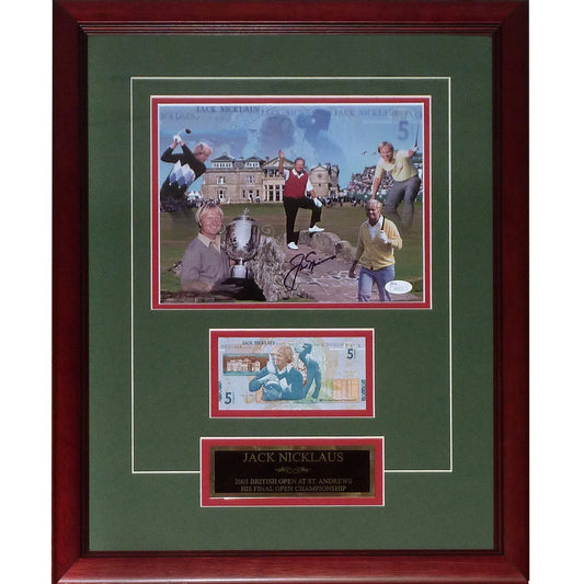 Framed display with burgundy border and green mat showing signed photograph of golfers at St. Andrews, autographed RBS five pound note, and commemorative plaque for 2005 British Open.