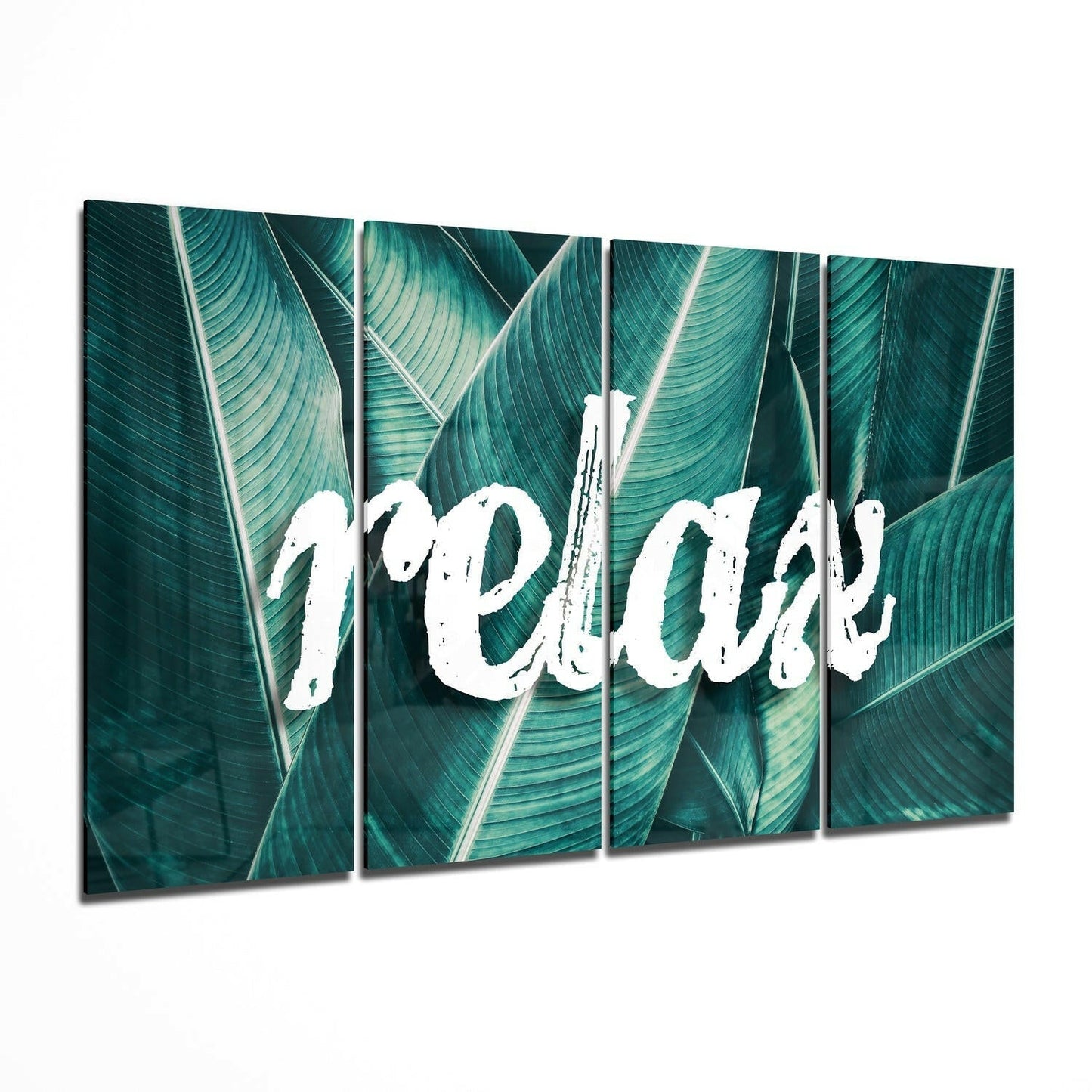 Four-panel glass wall art displaying white "Relax" text overlaid on close-up teal and green striped tropical leaves.