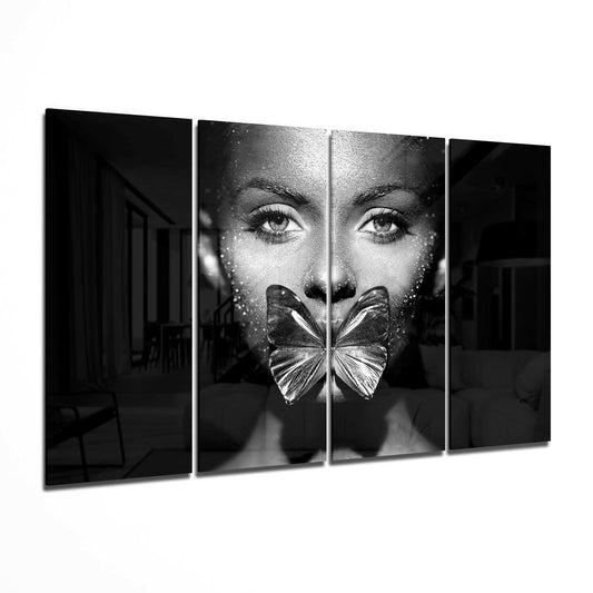 Four-panel black and white glass wall art displaying a woman's face with a butterfly covering her mouth, flanked by dark architectural interior scenes.