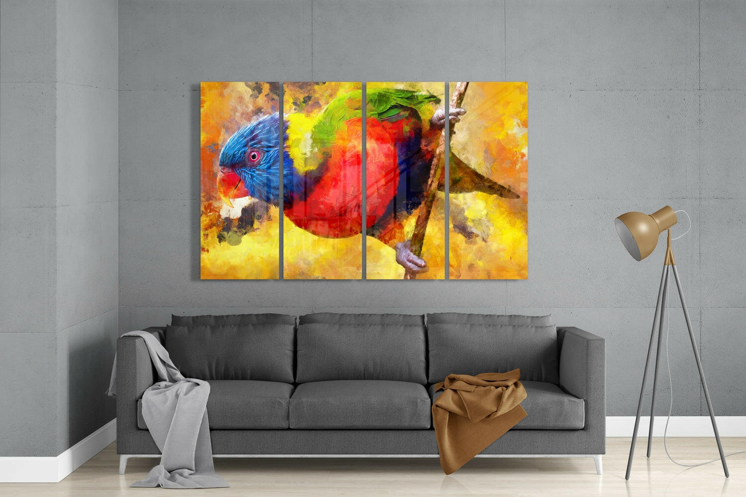 Four-panel glass wall art depicting a colorful rainbow lorikeet with blue head and red body displayed above a gray sofa in a modern living room.
