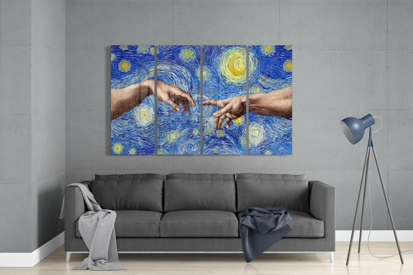 Modern living room with gray sofa displaying four-panel glass wall art featuring hands touching over blue starry background.