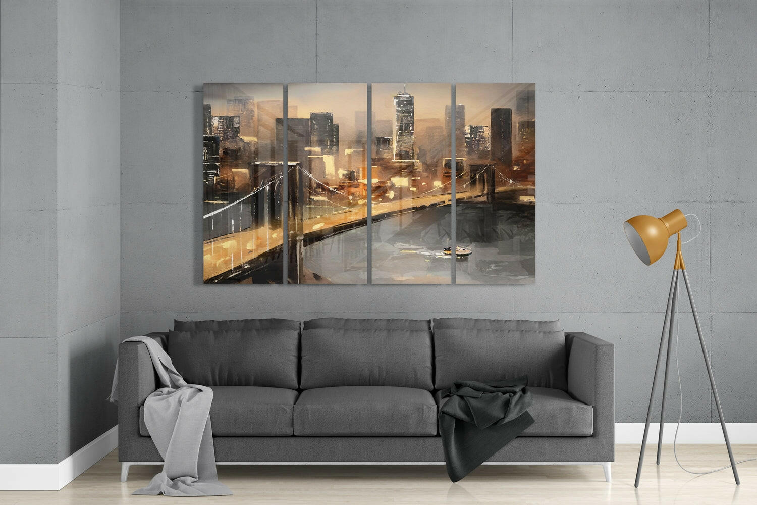 Four-panel glass wall art depicting a golden-hour cityscape with bridge and skyscrapers, displayed above a gray sofa in a modern living room.