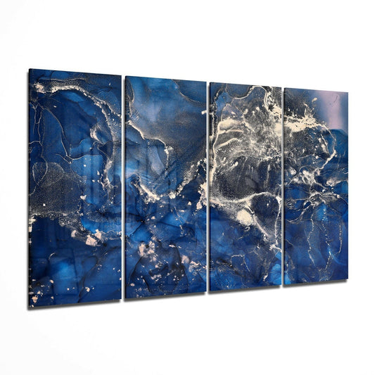 Four-panel navy blue and silver marble glass wall art displayed at an angle showing the complete assembled artwork with metallic veining throughout.