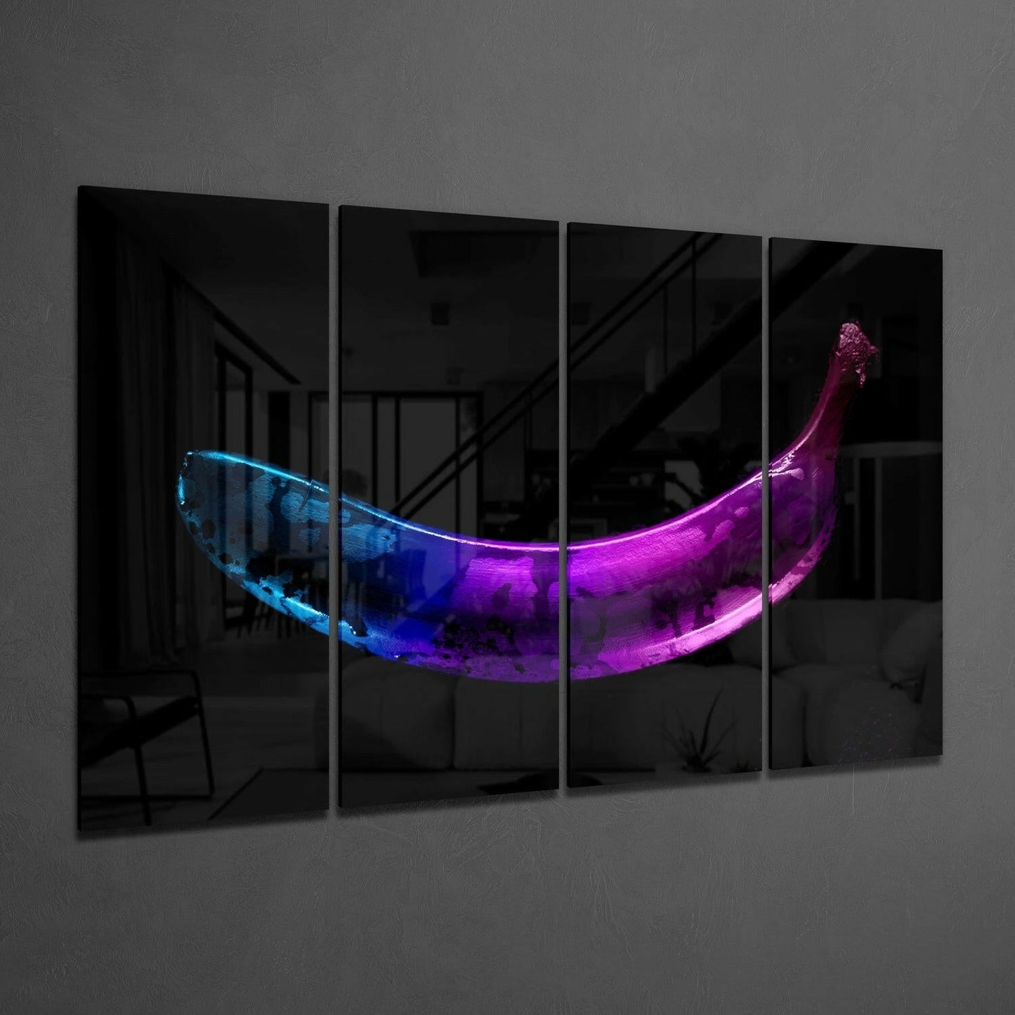 Four-panel glass wall art displaying a neon-lit banana with blue and magenta gradient lighting against a dark interior background.