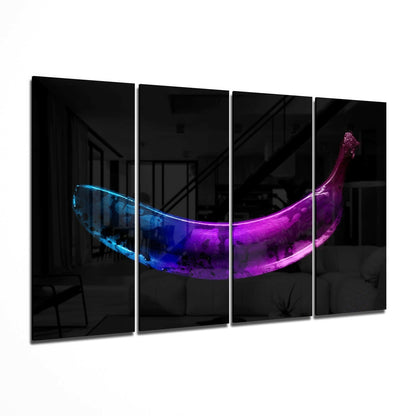 Four-panel glass wall art displaying a neon-lit banana glowing in blue and magenta gradient against a dark interior background.