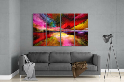 Four-panel glass wall art displaying vibrant swirling clouds in pink, red, yellow, and purple hues hung above a gray sofa in a modern living room.