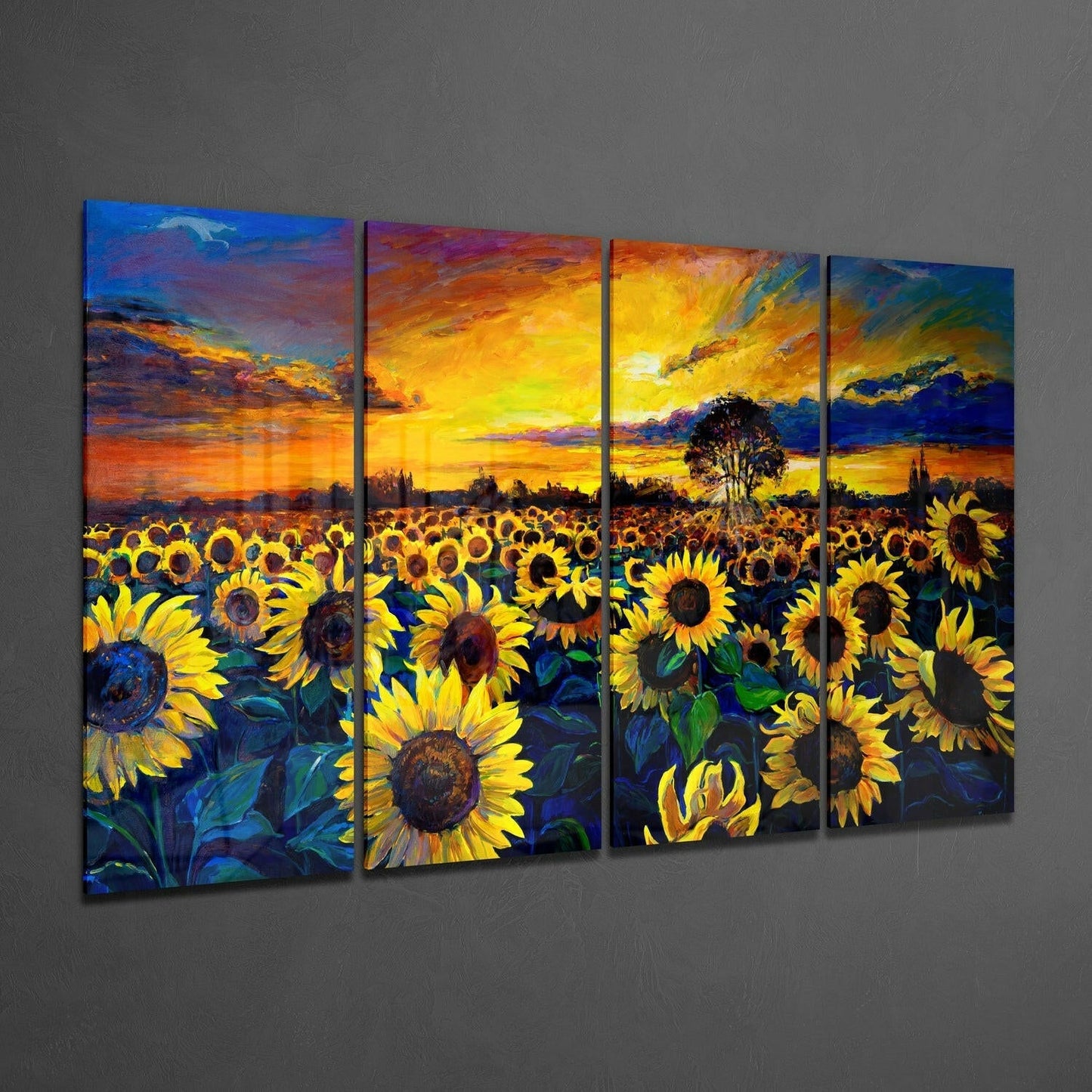 Four-panel glass wall art displaying a sunflower field at sunset with vibrant yellow flowers, orange sky, and silhouetted trees.