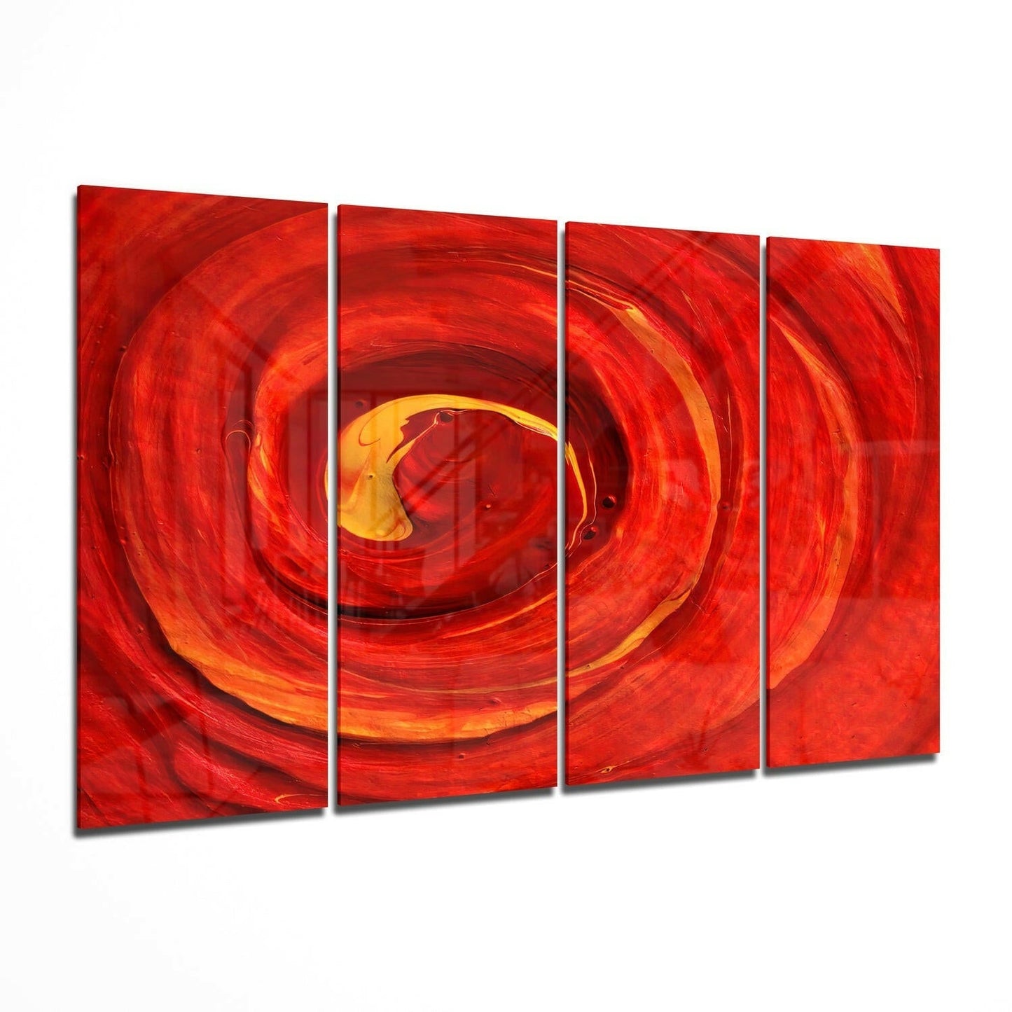 Four-panel glass wall art displaying concentric red and orange swirling vortex pattern with yellow center, angled display view.