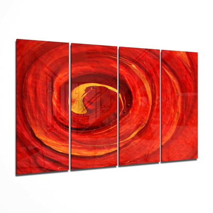 Four-panel glass wall art displaying concentric red and orange swirling vortex pattern with yellow center, angled display view.