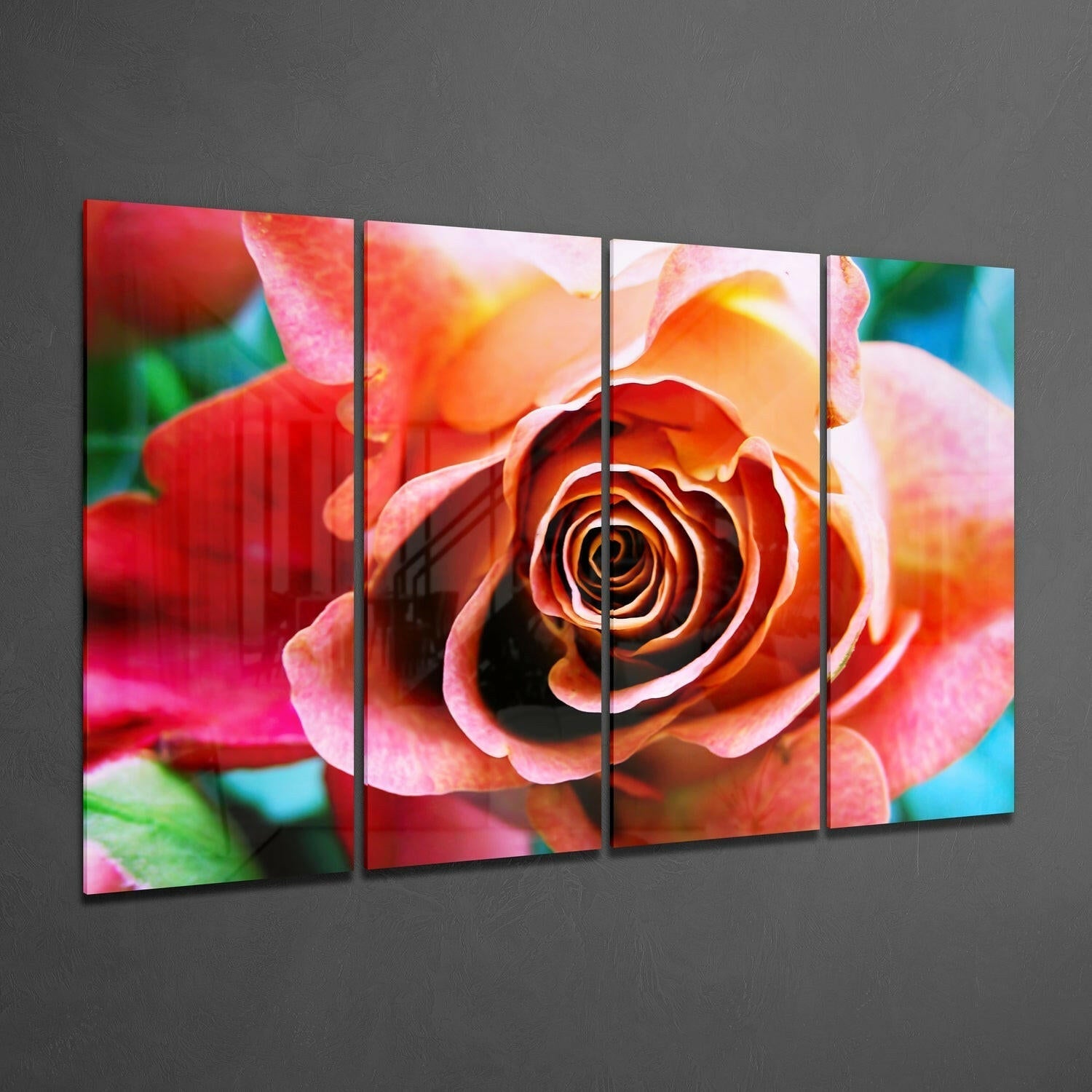 Four-panel glass wall art displaying a vibrant close-up of red and orange roses with green foliage against gray wall.