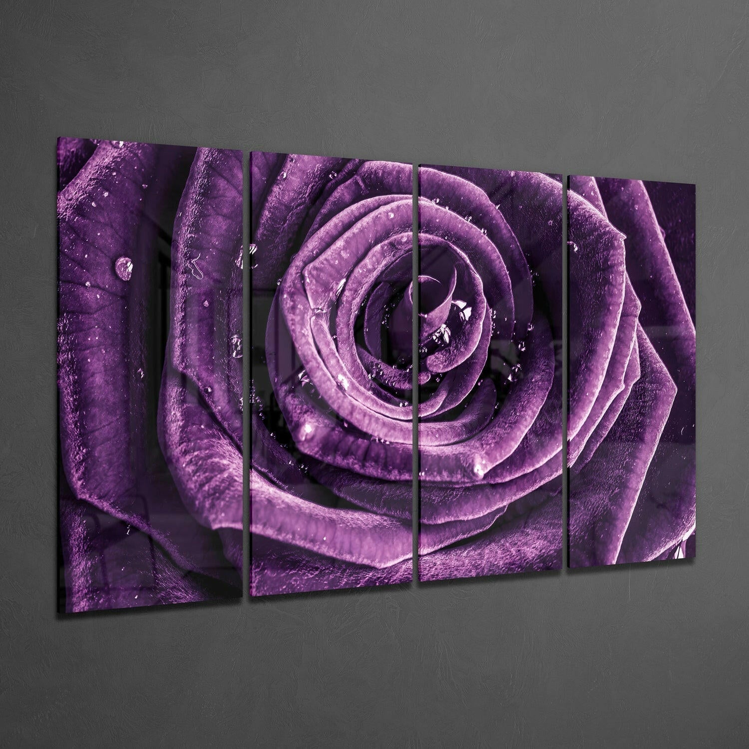 Four-panel glass wall art displaying a close-up purple rose with water droplets, mounted on gray wall.