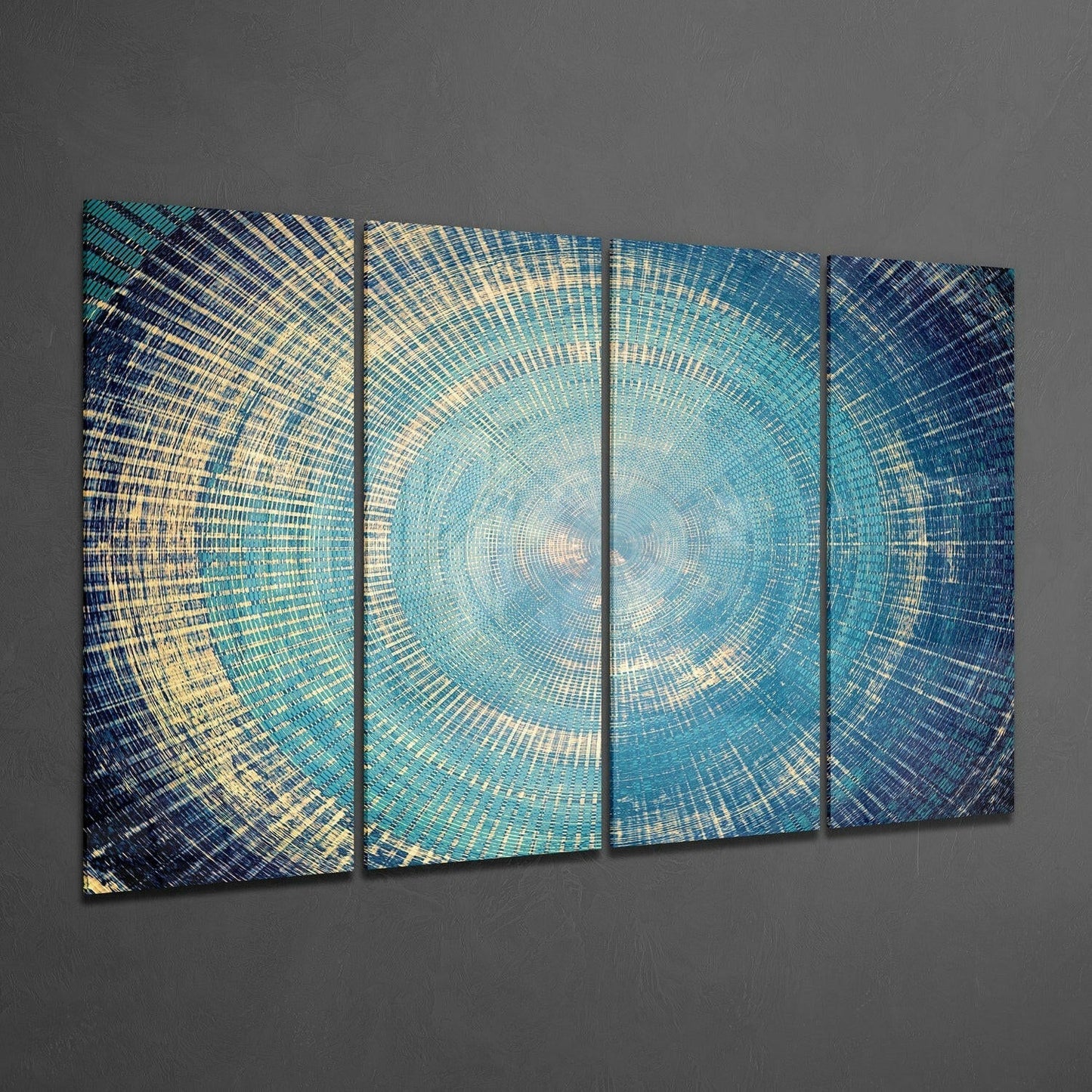 Four-panel turquoise glass wall art displaying concentric circular patterns in blue, teal, and cream tones mounted on gray wall.