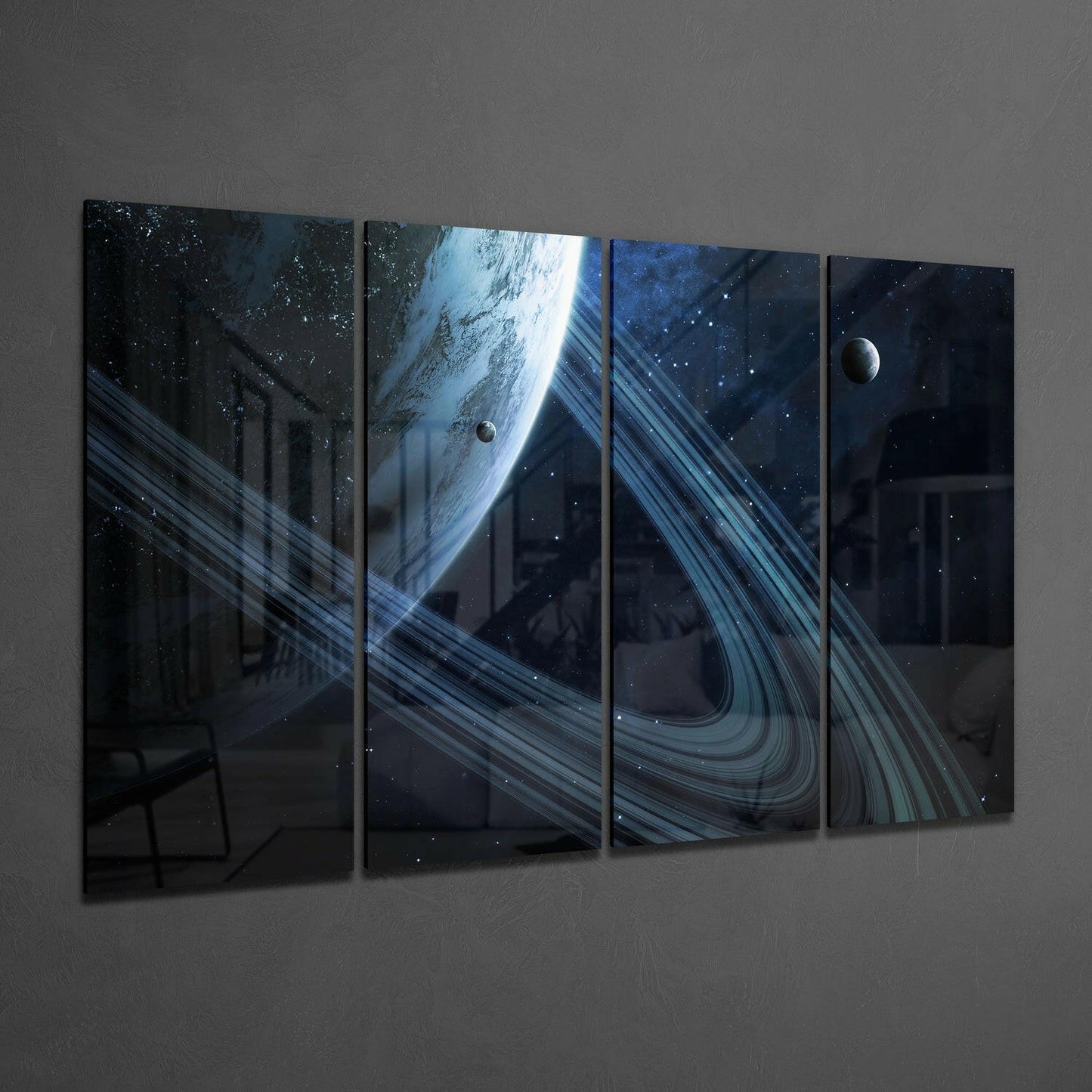 Four-panel glass wall art displaying a planet with blue-white rings and starfield against dark space, mounted on gray wall.