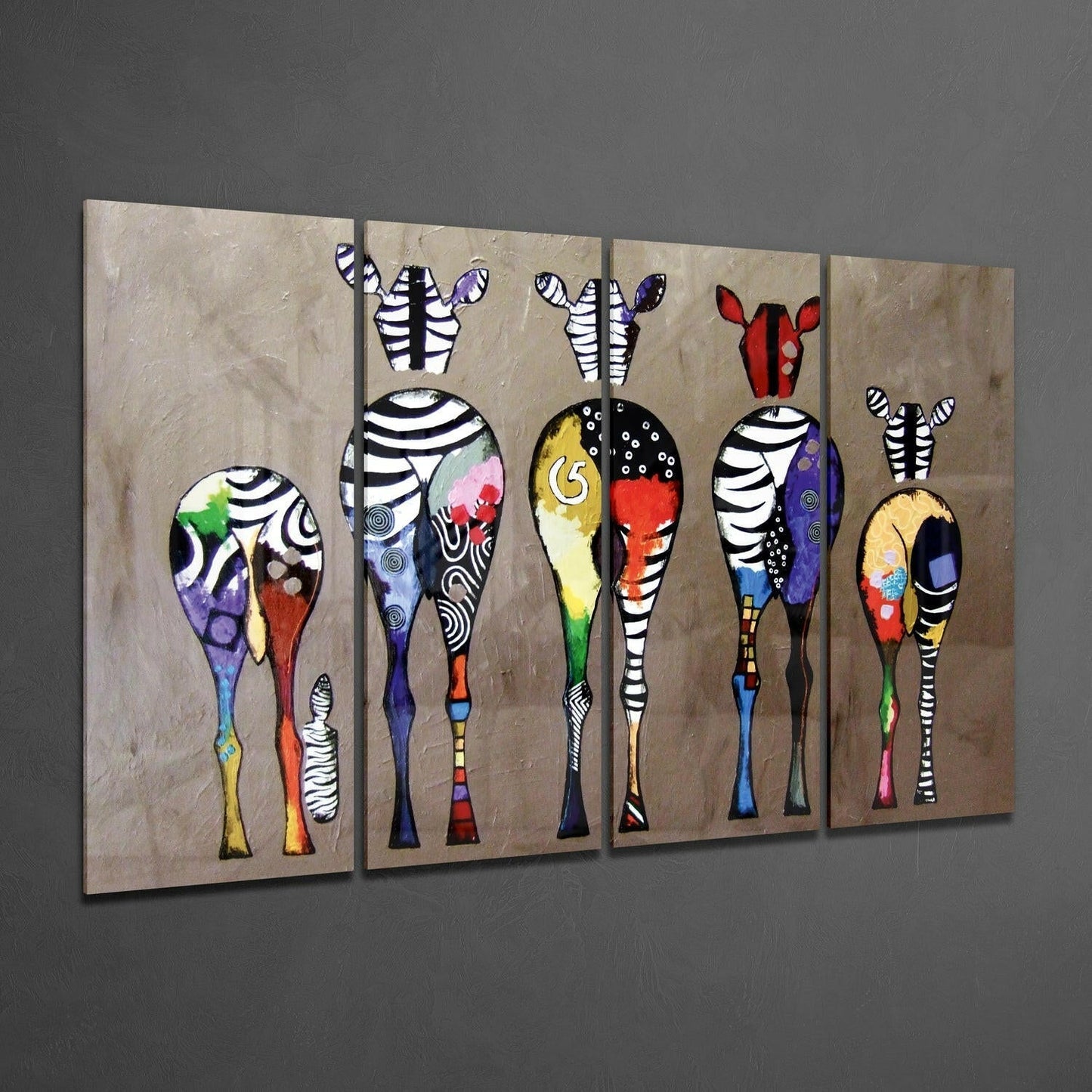 Four-panel glass wall art displaying stylized zebras with striped bodies in vibrant colors against beige background, hung on gray wall.