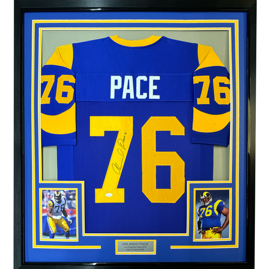 Framed blue Los Angeles Rams jersey number 76 with "PACE" nameplate, signed, flanked by two player photographs and JSA authentication label.