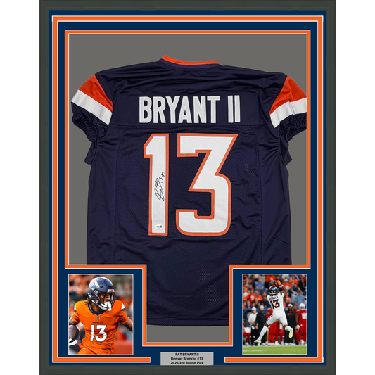 Back view of signed navy Denver Broncos jersey number 13 with "BRYANT II" nameplate, framed with photos and nameplate.