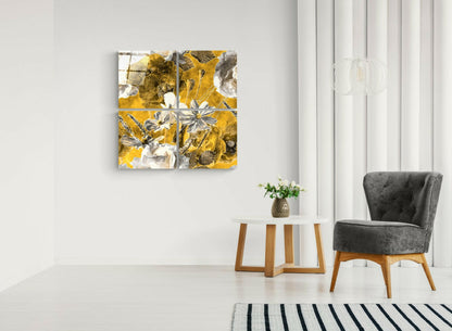 Modern living room interior featuring a four-panel yellow and white floral glass artwork hung above a white side table with wooden legs.