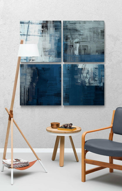 Modern interior scene with four-panel blue and white abstract glass wall art above wooden furniture and mid-century chairs.
