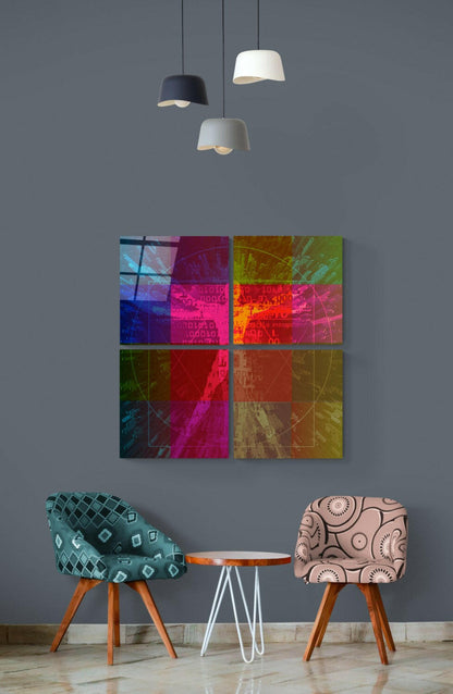 Colorful Touch Quadro Glass Wall Art displayed on gray wall above two patterned chairs and small table, with pendant lights above.