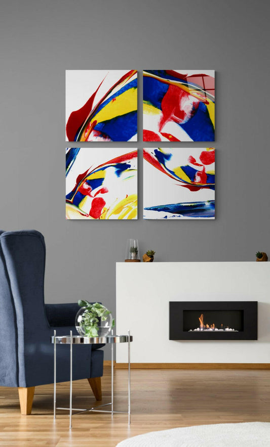 Four-panel glass wall art with abstract red, blue, and yellow brushstrokes displayed above a fireplace in a modern living room.