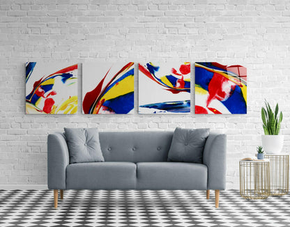 Gray sofa against white brick wall with four abstract glass art panels featuring red, blue, and yellow brushstrokes above.