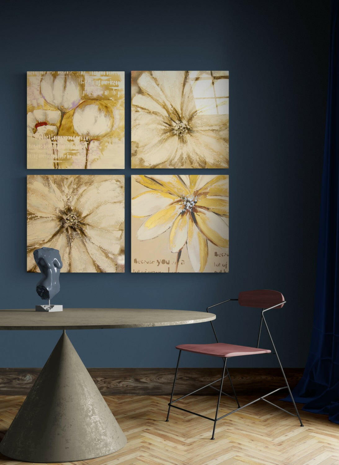 Four botanical glass wall art panels with cream, brown, and yellow flower designs displayed above a round concrete table in a blue room.