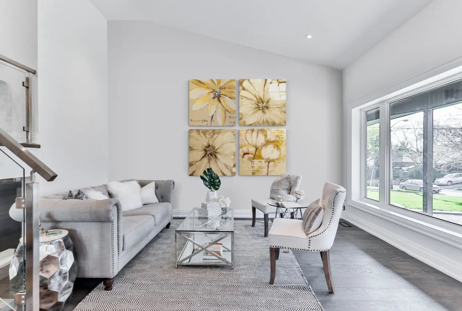 Four beige floral glass wall art prints with gold accents in 2x2 grid