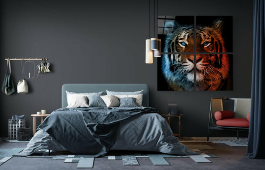 Four-panel glass wall art featuring a tiger's face split in blue and orange tones, displayed above a bed in a modern bedroom interior.