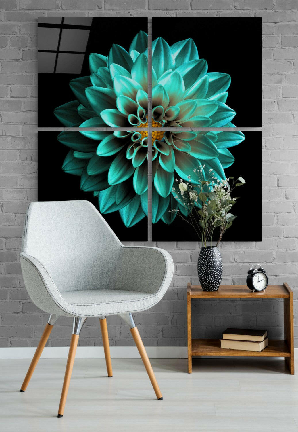 Four-panel turquoise dahlia wall art displayed above a white chair and wooden side table with dried flowers and clock.